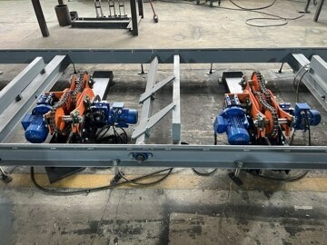 Цепной кантователь бревна